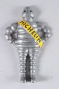 A MICHELIN MAN WALL FIGURE. 10ins high.