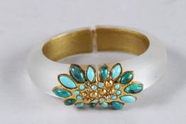 AN ALEXIS BITTAR HAND-CRAFTED BRACELET.