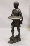 A GOOD LIFE SIZE BRONZE BLACKAMOOR carrying a tray. 5ft 6ins high.