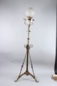 A 19TH CENTURY BRASS FLOOR STANDING LAMP with frosted glass shade. 4ft 2ins high.