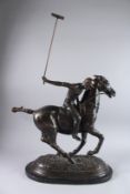 A GOOD LARGE BRONZE POLO PLAYER on a marble base. 22ins long.