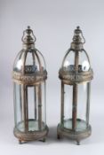 A PAIR OF CIRCULAR COPPER LANTERNS. 31ins high x 10ins diameter.