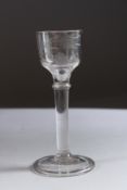 A GOOD GEORGIAN WINE GLASS, the bowl engraved with thistle and bird. 5.5ins high.