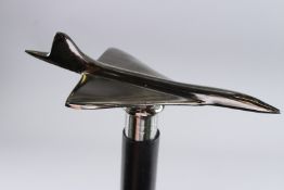 A WALKING STICK WITH CONCORDE HANDLE.