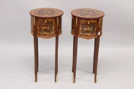 A PAIR OF LOUIS XVI STYLE CIRCULAR INLAID BEDSIDE TABLES with three drawers, on four curving legs.
