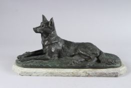 A BRONZE ALSATIAN. Signed. 15ins long, on a marble base.