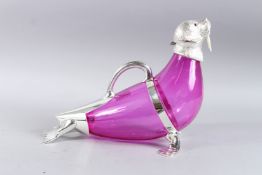 A GOOD LARGE RUBY TINTED GLASS AND PLATE WALRUS NOVELTY DECANTER. 16ins long.