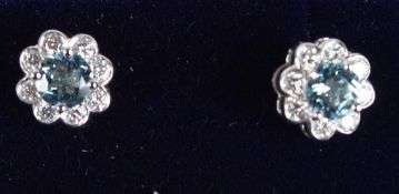 A PAIR OF 18CT WHITE GOLD, AQUAMARINE AND DIAMOND EAR STUDS.