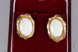 A VERY GOOD PAIR OF 18CT GOLD, OPAL AND DIAMOND EAR CLIPS.