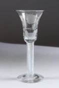 A GOOD GEORGIAN WINE GLASS with inverted bell bowl, engraved with roses, with air twist stem. 7ins
