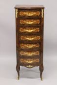 A TALL NARROW LOUIS XVI STYLE CHEST with seven drawers, on short curving legs. 4ft 2ins high x 1ft