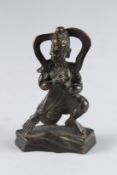 A CHINESE BRONZE GUANYIN. 4ins high.