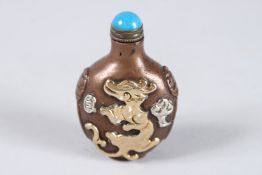 A CHINESE COPPER SNUFF BOTTLE with gilt dragon pattern.