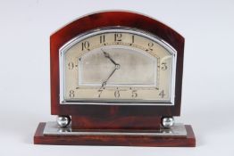 A RARE LARGE EARLY 20TH CENTURY ART DECO RED BAKELITE, possibly cherry amber, TABLE CLOCK. 7ins