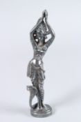 A 19TH CENTURY SILVER INDIAN GOD on an oval base. 9.5ins high.