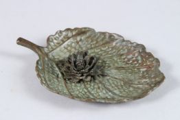 A JAPANESE OKIMONO LOTUS AND LEAF. 4.5ins high.