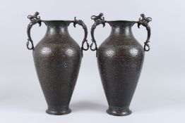 A FINE LARGE PAIR OF 19TH CENTURY INDIAN KASHMIRI ENAMELLED COPPER TWIN HANDLED VASES with