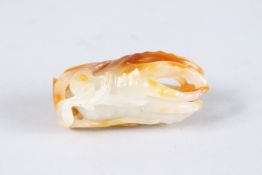 A VERY FINE 19TH CENTURY CHINESE JADE CARVING DEPICTING RUYI, made from white jade with natural