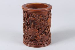 A GOOD CANTON CARVED WOOD CIRCULAR BRUSH POT. 4.5ins high.