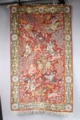 A GOOD PERSIAN WOOLWORK RUG with figures on horseback etc. Signed. 5ft x 3ft.