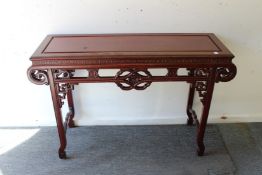 A LONG CHINESE REDWOOD NARROW ALTAR TABLE with plain top. 4ft long x 1ft 4ins wide x 2ft 10ins