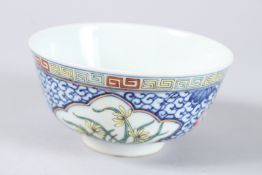 AN EARLY 20TH CENTURY POLYCHROME BOWL. 4.25ins diameter.