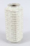 A CHINESE GE WARE CRACKLE GLAZE GONG SHAPE VASE. 23cms high.