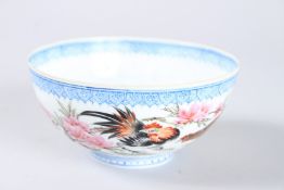A CHINESE REPUBLIC PERIOD CIRCULAR FAMILLE ROSE BOWL. 4.5ins diameter.