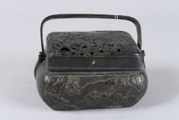 A JAPANESE BRONZE BASKET with carrying handle.