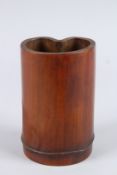 A CHINESE DOUBLE BAMBOO VASE. 6ins high.