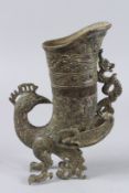 AN ARCHAIC BRONZE BIRD VESSEL. 12ins high.