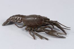A LARGE JAPANESE BRONZE ARTICULATED LOBSTER. 10.5ins long.