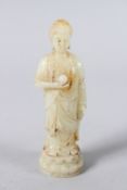 A CARVED WHITE JADE GOD FIGURE. 8ins high.