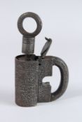 A PERSIAN METAL PADLOCK decorated with calligraphy. 7ins high.
