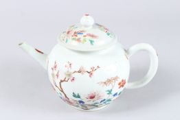 AN 18TH CENTURY CHINESE PORCELAIN BULBOUS TEAPOT AND COVER, painted with flowers. 5ins diameter.