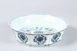 A CHINESE PETAL SHAPE BLUE AND WHITE BOWL. 7.5ins diameter.