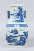 A CHINESE BLUE AND WHITE ARROW VASE with mountain design and calligraphy. 15ins high.
