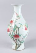 A CHINESE FAMILLE ROSE PEACH BRANCH PATTERN VASE. 15ins high.