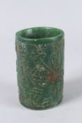 A GOOD CHINESE CARVED JADE CIRCULAR BRUSH POT. 4.75ins high.