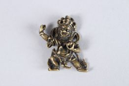 A TINY TIBETAN METAL BUDDHA. 1.25ins high.