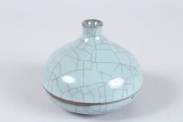 A 19TH CENTURY CHINESE CARVED GLASS CIRCULAR WATER DROPPER. 4.5ins diameter.