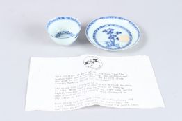 A NANKING CARGO BLUE AND WHITE TEA BOWL ND SAUCER.
