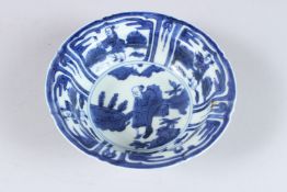 A CHINESE MING STYLE BLUE AND WHITE BOWL. 5.5ins diameter.