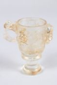 A CHINESE GLASS LIBATION CUP. 3.5ins high.