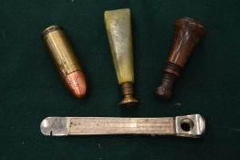 Cigar cutter, two seals and a bullet shaped lighter.