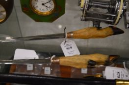 Two deers foot handled letter openers.