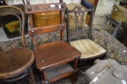 A Victorian metamorphic chair/steps (repaired) together with another chair.