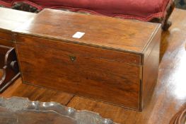 A 19th century rosewood tea caddy with fitted interior.