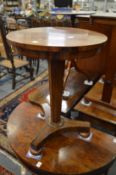 A Victorian rosewood circular occasional table.