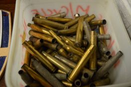 Quantity of brass shell cases.